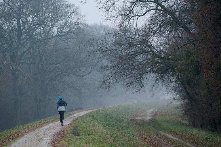 Runner running in the UK in cold conditions