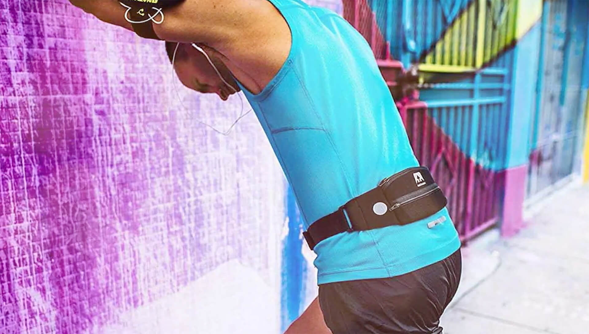 A runner in the UK wearing a running belt to hold their running essentials