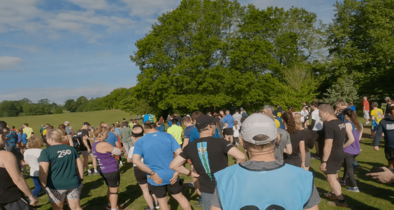 Runners showing good running etiquette by lining up in the correct places at the start of a parkrun